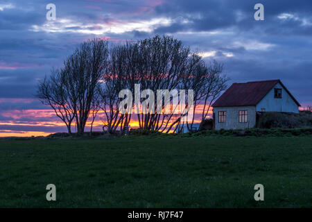 Nordeuropa, Isola, Südisland, Seljalandsfoss, Sonnenuntergang im Süden isole Foto Stock