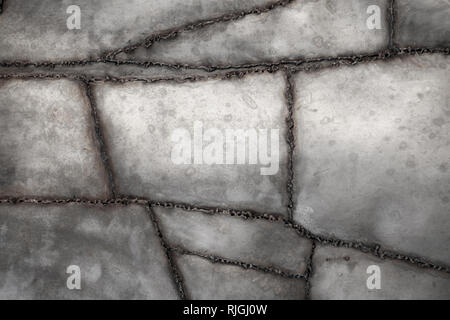 Ruvida di metallo saldata sullo sfondo di texture Foto Stock