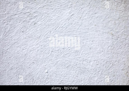 Vecchio, bianco, cemento intonacato di pietra e la tessitura della parete di cemento. Sfondo. Foto Stock