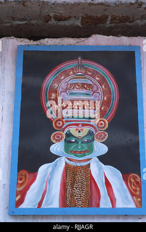 Didascalia: Fort Cochin, Kerala, India - Maggio 2003. Un poster che illustra un carattere da Kathakali- un classico del Kerala Dance Theatre dove altamente sk Foto Stock