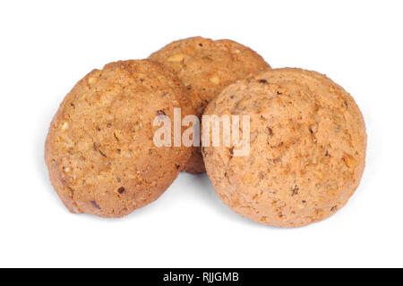 Pila di fiocchi d'avena e gustosi biscotti isolato su bianco Foto Stock