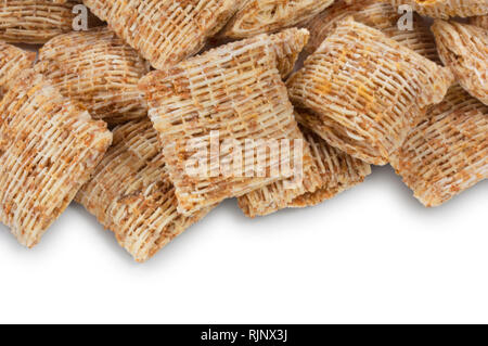 Studio shot del morso in miniatura di dimensione di grano trinciato isolata contro uno sfondo bianco - Giovanni Gollop Foto Stock