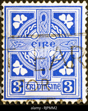 Disegno celtico su red irish francobollo Foto Stock