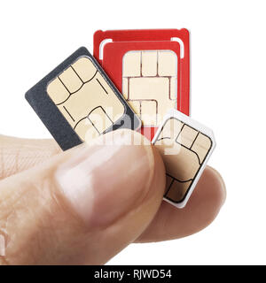 Tre carte SIM in mano isolati su sfondo bianco Foto Stock