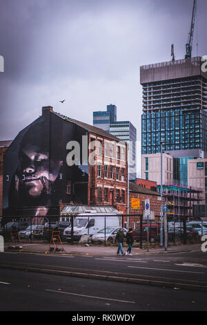 Manchester, Inghilterra, Regno Unito. 20 agosto 2018: Arte di strada in piovoso manchster Foto Stock