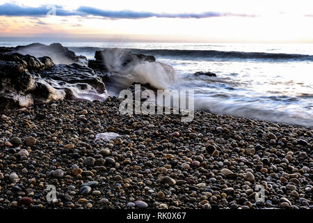 Coastal albe e tramonti in Galles Foto Stock