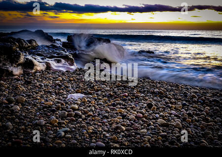 Coastal albe e tramonti in Galles Foto Stock