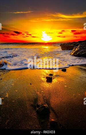 Coastal albe e tramonti in Galles Foto Stock