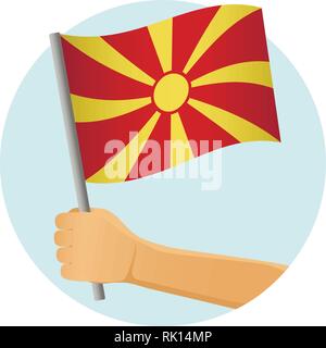 Bandiera della Macedonia in mano. Sfondo patriottico. Bandiera nazionale della Macedonia illustrazione vettoriale Illustrazione Vettoriale
