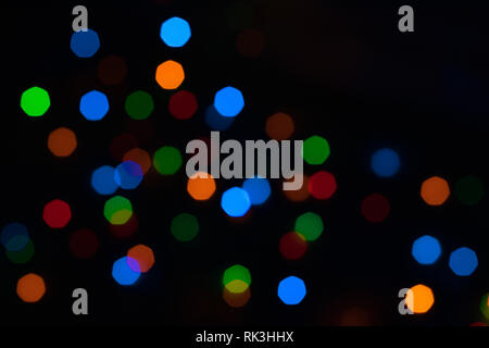 Immagine colorata di Bokeh di fondo con le luci di Natale Foto Stock