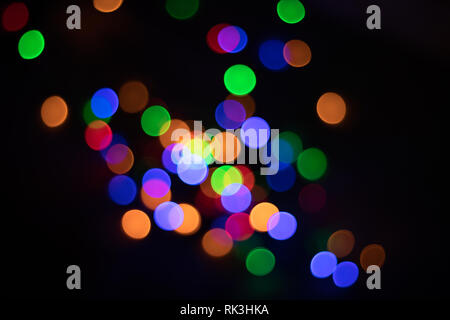 Immagine colorata di Bokeh di fondo con le luci di Natale Foto Stock