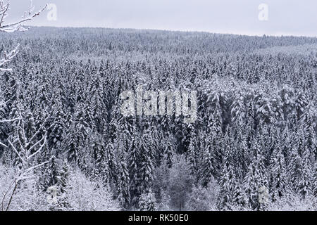 Fantastic evening winter landscape. Dramatic overcast sky. Creative collage. Beauty world. Foto Stock