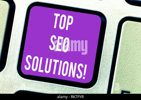 Parola di scrittura di testo Top Seo soluzioni. Il concetto di business per la metodologia delle tecniche per aumentare la quantità di visitatori tasto tastiera intenzione di creare co Foto Stock