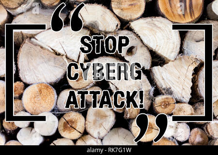 La scrittura della nota mostra Stop cyber attacco. Business photo vetrina per impedire il tentativo da parte di hacker danni distruggere la rete di computer lo sfondo di legno vintage Foto Stock