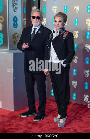 Londra, Regno Unito. 10 Febbraio, 2019. Roger Taylor e Sarina Taylor assiste l'EE British Academy Film Awards presso la Royal Albert Hall di Londra, Inghilterra il 10 febbraio 2019 Credit: Gary Mitchell, GMP Media/Alamy Live News Foto Stock