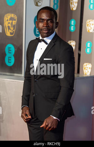 Londra, Regno Unito. 10 Febbraio, 2019. Jimmy Akingbola assiste l'EE British Academy Film Awards presso la Royal Albert Hall di Londra, Inghilterra il 10 febbraio 2019 Credit: Gary Mitchell, GMP Media/Alamy Live News Foto Stock