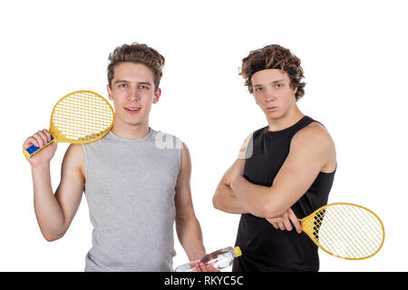 Due ragazzi bello giocare a tennis isolato Foto Stock