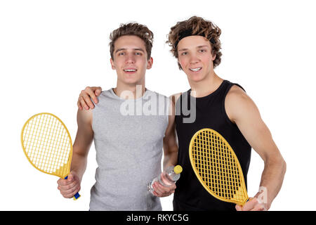 Due ragazzi bello giocare a tennis isolato Foto Stock