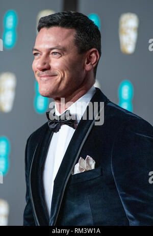 Luke Evans assiste l'EE British Academy Film Awards presso la Royal Albert Hall. Foto Stock