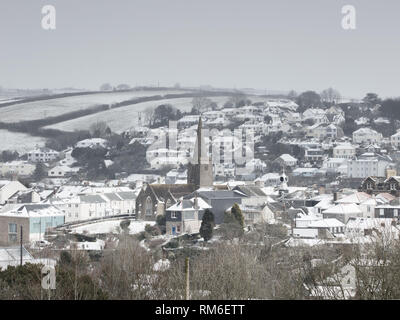 Una copertura di neve hits Kingsbridge su una molto rara occasione. Foto Stock