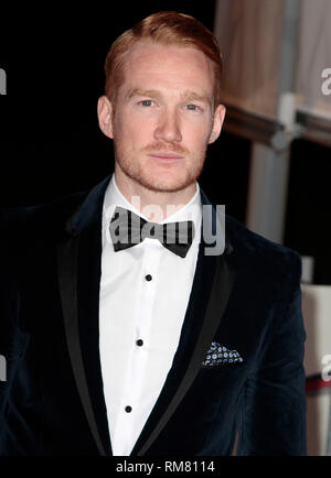 Dic 10, 2014 - Greg Rutherford partecipando a una notte di eroi: i militari Sun Awards - Red Carpet gli arrivi al National Maritime Museum di Londra Foto Stock