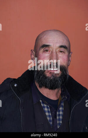 Uomo anziano testa calva e la barba.asiatici Foto Stock