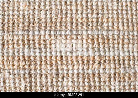 Il tessuto di iuta o di iuta spessi tappeti per lo sfondo. Chiusura del sacco naturale texture. Copia spazio per il testo. Foto Stock