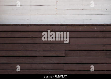 Legno pregiato texture. Di aspetto rustico e scuro, ocra, marrone, tostato, toni di nero. Le venature e i nodi sono apprezzati. In legno naturale, sfondo Foto Stock