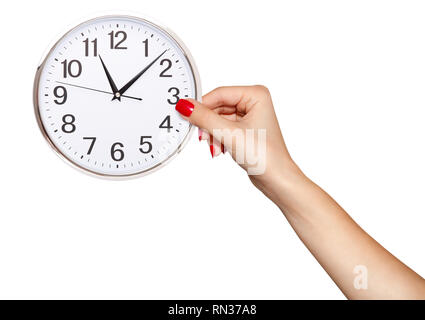 Mano umana tenendo il tempo dell'Orologio. Programmare la sveglia il concetto di tempo Foto Stock