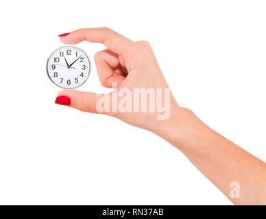 Mano umana tenendo il tempo dell'Orologio. Programmare la sveglia il concetto di tempo Foto Stock