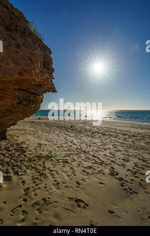 Tramonto sulla spiaggia della baia di bollette, Coral Bay Coral Coast, Australia occidentale Foto Stock