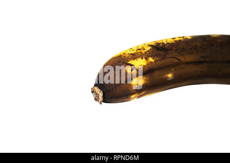 Banana nero su uno sfondo bianco. isolato Foto Stock