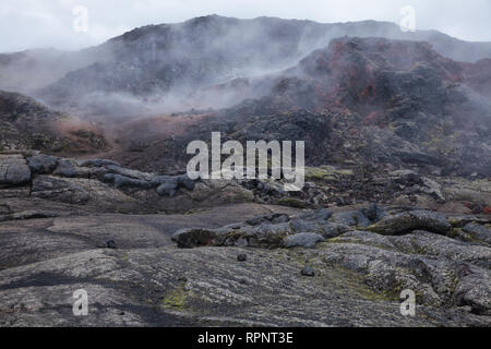 Fumante campo di lava a Krafla area vulcanica nella regione di Mývatn, Nordest Islanda e Scandinavia Foto Stock