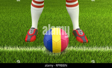 L uomo e il pallone da calcio con bandiera Foto Stock