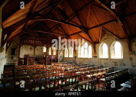 St Agnes', la Chiesa con il tetto di paglia Baia di acqua dolce, Isle of Wight, England, Regno Unito Foto Stock