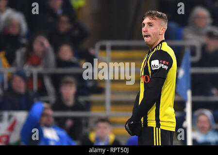 Watford's Gerard Deulofeu punteggio celebra il suo lato il terzo obiettivo del gioco durante il match di Premier League al Cardiff City Stadium. Foto Stock