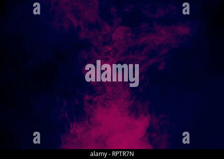 Il fumo colorato. Colori al neon esplosione. Foto Stock