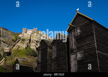 La pesca di capanne in vecchio Hastings Foto Stock