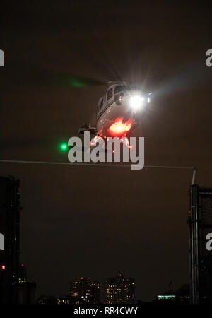 New York City, United States - November 17 2018:   A Helicopter comes in to land an a New York Heliport on 12th Avenue Foto Stock