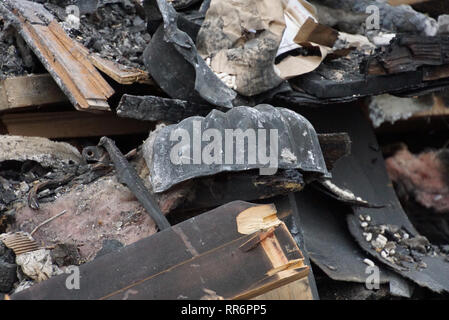 Cimeli e memorie, i tuoi ricordi e la proprietà diventa cenere in una casa di fuoco non importa il prezzo o il livello di tecnologia. Foto Stock