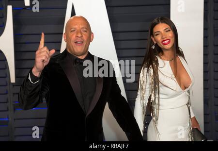 Los Angeles, California, USA. Il 25 febbraio, 2019. Vin Diesel e la moglie Paloma Jimenez frequentare il Vanity Fair Oscar Party a Wallis Annenberg Center for the Performing Arts di Beverly Hills, Los Angeles, Stati Uniti d'America, il 24 febbraio 2019. | Utilizzo di credito in tutto il mondo: dpa picture alliance/Alamy Live News Foto Stock