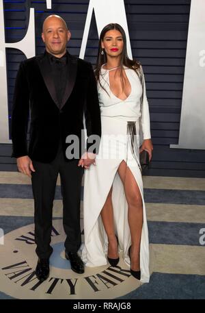 Los Angeles, California, USA. Il 25 febbraio, 2019. Vin Diesel e la moglie Paloma Jimenez frequentare il Vanity Fair Oscar Party a Wallis Annenberg Center for the Performing Arts di Beverly Hills, Los Angeles, Stati Uniti d'America, il 24 febbraio 2019. | Utilizzo di credito in tutto il mondo: dpa picture alliance/Alamy Live News Foto Stock