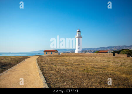 Paphos faro al tramonto Foto Stock