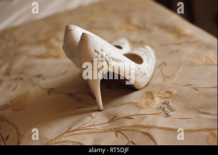 Sposa dettagli nozze - Matrimonio scarpe come un backgrond Foto Stock