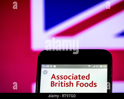 British Foods Plc logo che si vede visualizzato sul telefono intelligente Foto Stock