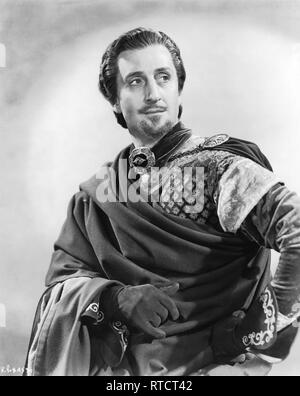 Basil Rathbone come Sir Guy di Gisbourne LE AVVENTURE DI ROBIN HOOD 1938 registi Michael Curtiz William Keighley Warner Bros Foto Stock