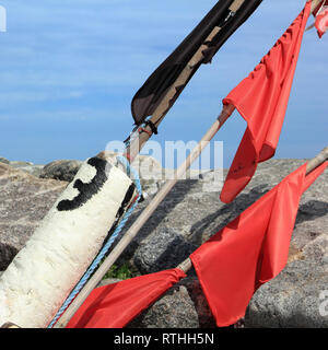 Le boe di segnalazione in banchina Foto Stock