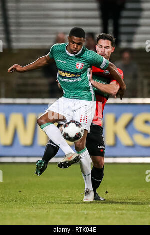 Dordrecht, Paesi Bassi. 01 Mar, 2019. Riwal Hoogwerkers Stadium, calcio, stagione 2018/2019, Keuken Kampioen Divisie, FC Dordrecht - NEC, FC Dordrecht player Jeremy Cijntje (l) NEC player Guus Joppen Credito: Pro scatti/Alamy Live News Foto Stock