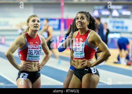 Glasgow, Scotland, Regno Unito. 2 Marzo, 2019. DEL PONTE Ajla SUI e KAMBUNDJI Mujinga sui concorrenti del 60m donne evento finale durante il giorno due dell'Europeo di Atletica Leggera Indoor Championships 2019 a Emirates Arena di Glasgow, Scotland, Regno Unito. 2.03.2019 Credito: Cronos/Alamy Live News Foto Stock