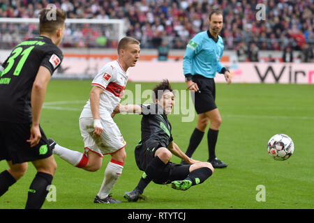 Stuttgart, Germania. 03 Mar, 2019. Genki HARAGUCHI (Hannover96), azione, duelli contro Santiago ASCACIBAR (VFB Stoccarda) . Il calcio 1. Bundesliga, 24.Spieltag, giornata24, VFB Stuttgart-Hanover 96 (H) 5-1, 03.03.2019 a Stoccarda/Germania. MERCEDES BENZ ARENA. DFL regolamenti vietano qualsiasi uso della fotografia come sequenze di immagini e/o quasi video. | Utilizzo di credito in tutto il mondo: dpa/Alamy Live News Foto Stock